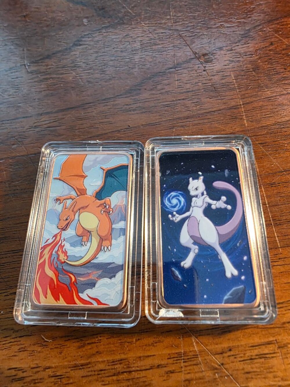 1-CHARIZARD AND 1-MEWTWO A WNSUM BOTH POKEMON BARS 1 OZ. COPPER